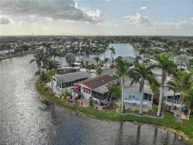 Don't miss out on this mobile home with breathtaking lake views on Silver Lakes Resort and Golf Club in Florida - for sale on GolfHomes.com, golf home, golf lot