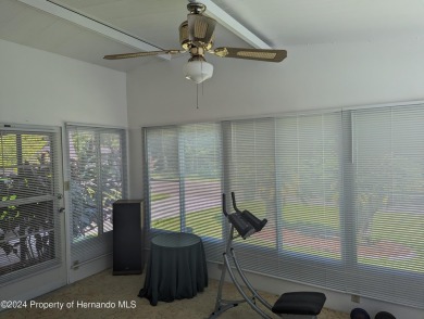 NICE 2 BED, 2 BATH WITH A 1 CAR GARAGE AND A 2 CAR CARPORT IN on Continental Country Club in Florida - for sale on GolfHomes.com, golf home, golf lot