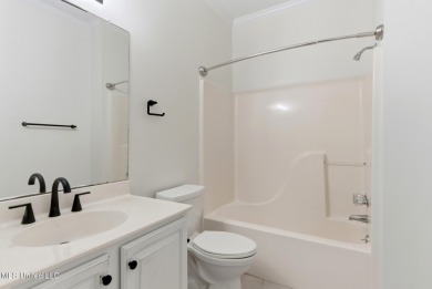 Beautiful 3-Bedroom, 2-Bath Home on Half-Acre Corner Lot in on Diamondhead Country Club in Mississippi - for sale on GolfHomes.com, golf home, golf lot