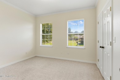 Beautiful 3-Bedroom, 2-Bath Home on Half-Acre Corner Lot in on Diamondhead Country Club in Mississippi - for sale on GolfHomes.com, golf home, golf lot