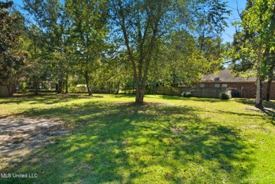 Beautiful 3-Bedroom, 2-Bath Home on Half-Acre Corner Lot in on Diamondhead Country Club in Mississippi - for sale on GolfHomes.com, golf home, golf lot