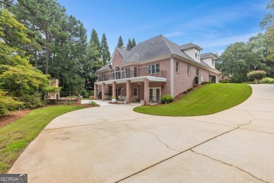 FIRST TIME ON THE MARKET! This exquisite 4-side blush brick on Royal Lakes Golf and Country Club in Georgia - for sale on GolfHomes.com, golf home, golf lot