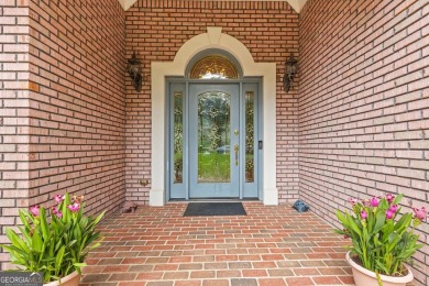 FIRST TIME ON THE MARKET! This exquisite 4-side blush brick on Royal Lakes Golf and Country Club in Georgia - for sale on GolfHomes.com, golf home, golf lot