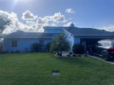 Stunning home in the sought-after Wingfoot neighborhood on Suntree Country Club in Florida - for sale on GolfHomes.com, golf home, golf lot