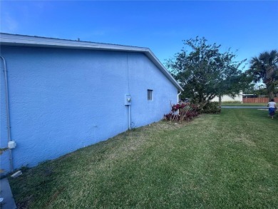 Stunning home in the sought-after Wingfoot neighborhood on Suntree Country Club in Florida - for sale on GolfHomes.com, golf home, golf lot