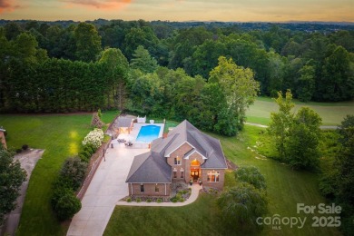 This beautifully updated home is perfectly designed for modern on Catawba Springs Golf Course At Lake Hickory  in North Carolina - for sale on GolfHomes.com, golf home, golf lot