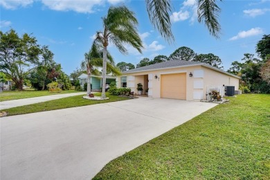 CBS 3 bedroom 2 bathroom home on a pet-friendly lot located on a on Spanish Lakes Country Club in Florida - for sale on GolfHomes.com, golf home, golf lot