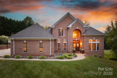 This beautifully updated home is perfectly designed for modern on Catawba Springs Golf Course At Lake Hickory  in North Carolina - for sale on GolfHomes.com, golf home, golf lot