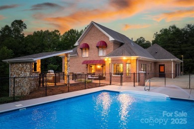 This beautifully updated home is perfectly designed for modern on Catawba Springs Golf Course At Lake Hickory  in North Carolina - for sale on GolfHomes.com, golf home, golf lot