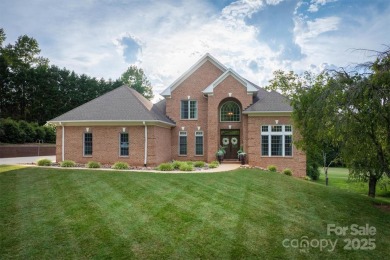 This beautifully updated home is perfectly designed for modern on Catawba Springs Golf Course At Lake Hickory  in North Carolina - for sale on GolfHomes.com, golf home, golf lot