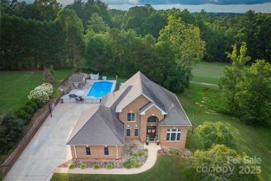 This beautifully updated home is perfectly designed for modern on Catawba Springs Golf Course At Lake Hickory  in North Carolina - for sale on GolfHomes.com, golf home, golf lot