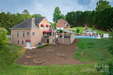 This beautifully updated home is perfectly designed for modern on Catawba Springs Golf Course At Lake Hickory  in North Carolina - for sale on GolfHomes.com, golf home, golf lot