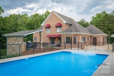 This beautifully updated home is perfectly designed for modern on Catawba Springs Golf Course At Lake Hickory  in North Carolina - for sale on GolfHomes.com, golf home, golf lot