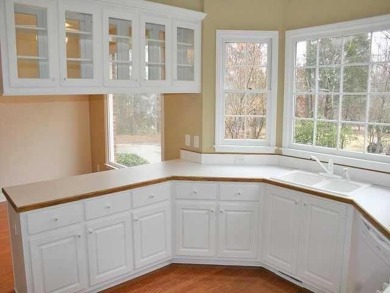 Charming 5 bedroom/4.5 bath Cape Cod-style home in Snellville's on Country Club of Gwinnett in Georgia - for sale on GolfHomes.com, golf home, golf lot