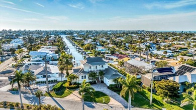 Elevated waterfront living in Key Royale -- built for confidence on Key Royale Club in Florida - for sale on GolfHomes.com, golf home, golf lot