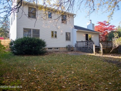 This beautifully maintained 4-bedroom, 2.5-bath single-family on Wolferts Roost Country Club in New York - for sale on GolfHomes.com, golf home, golf lot