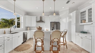 Elevated waterfront living in Key Royale -- built for confidence on Key Royale Club in Florida - for sale on GolfHomes.com, golf home, golf lot