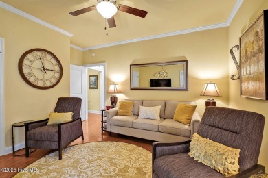 This home has it all! Curb appeal, low maintenance, attention to on Cape Fear National At Brunswick Forest in North Carolina - for sale on GolfHomes.com, golf home, golf lot