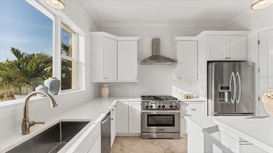 Elevated waterfront living in Key Royale -- built for confidence on Key Royale Club in Florida - for sale on GolfHomes.com, golf home, golf lot