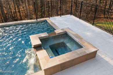 Stunning 5-bedroom, 5.5-bath luxury home on 1.2 acres featuring on The Club River Forest in Georgia - for sale on GolfHomes.com, golf home, golf lot