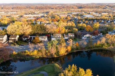 This beautifully maintained 4-bedroom, 2.5-bath single-family on Wolferts Roost Country Club in New York - for sale on GolfHomes.com, golf home, golf lot