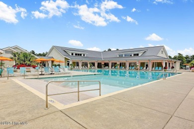 This home has it all! Curb appeal, low maintenance, attention to on Cape Fear National At Brunswick Forest in North Carolina - for sale on GolfHomes.com, golf home, golf lot