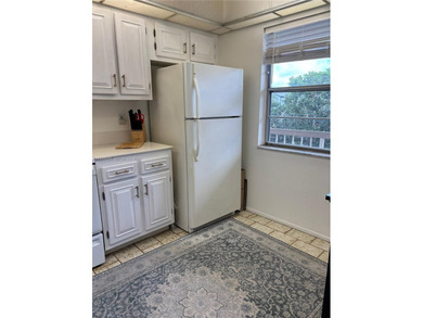 Welcome to resort-style living in this beautifully maintained on Wynmoor Golf Course in Florida - for sale on GolfHomes.com, golf home, golf lot