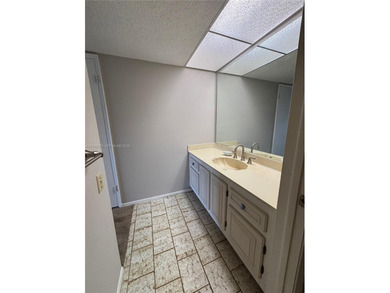 Welcome to resort-style living in this beautifully maintained on Wynmoor Golf Course in Florida - for sale on GolfHomes.com, golf home, golf lot