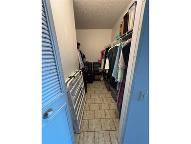 Welcome to resort-style living in this beautifully maintained on Wynmoor Golf Course in Florida - for sale on GolfHomes.com, golf home, golf lot