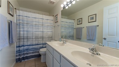 Come see the BIG lake views from this 3 bedroom, 3 bathroom on The Club At Old Kinderhook in Missouri - for sale on GolfHomes.com, golf home, golf lot