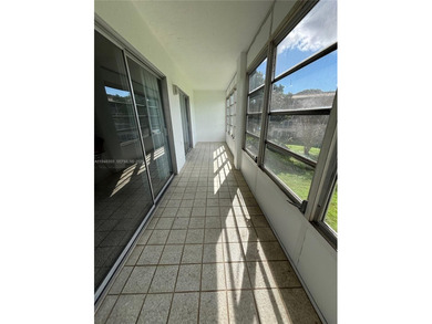 Welcome to resort-style living in this beautifully maintained on Wynmoor Golf Course in Florida - for sale on GolfHomes.com, golf home, golf lot