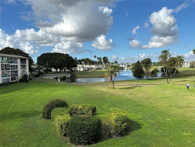 Welcome to resort-style living in this beautifully maintained on Wynmoor Golf Course in Florida - for sale on GolfHomes.com, golf home, golf lot