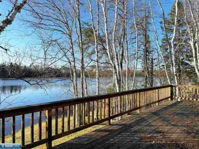 Mid Century Modern Lake Cottage! Private Golf Course Out Front on Eshquaguma Country Club in Minnesota - for sale on GolfHomes.com, golf home, golf lot