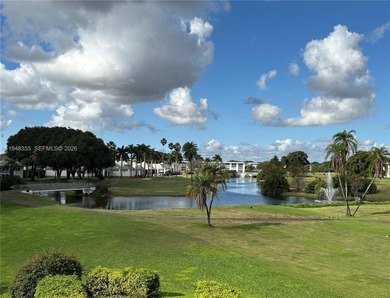 Welcome to resort-style living in this beautifully maintained on Wynmoor Golf Course in Florida - for sale on GolfHomes.com, golf home, golf lot