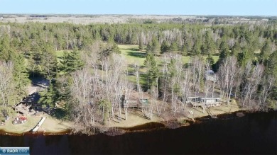 Mid Century Modern Lake Cottage! Private Golf Course Out Front on Eshquaguma Country Club in Minnesota - for sale on GolfHomes.com, golf home, golf lot