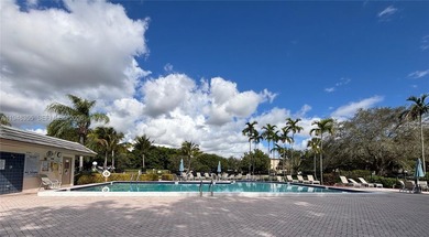 Welcome to resort-style living in this beautifully maintained on Wynmoor Golf Course in Florida - for sale on GolfHomes.com, golf home, golf lot