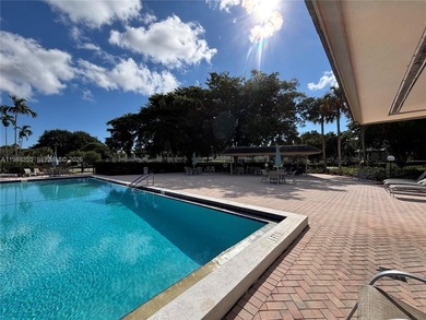 Welcome to resort-style living in this beautifully maintained on Wynmoor Golf Course in Florida - for sale on GolfHomes.com, golf home, golf lot