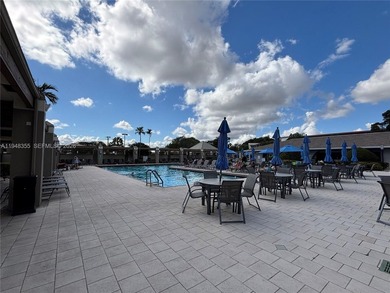 Welcome to resort-style living in this beautifully maintained on Wynmoor Golf Course in Florida - for sale on GolfHomes.com, golf home, golf lot