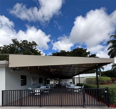 Welcome to resort-style living in this beautifully maintained on Wynmoor Golf Course in Florida - for sale on GolfHomes.com, golf home, golf lot