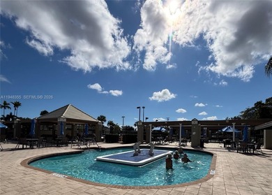 Welcome to resort-style living in this beautifully maintained on Wynmoor Golf Course in Florida - for sale on GolfHomes.com, golf home, golf lot