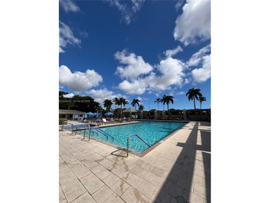 Welcome to resort-style living in this beautifully maintained on Wynmoor Golf Course in Florida - for sale on GolfHomes.com, golf home, golf lot