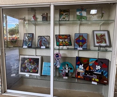 Welcome to resort-style living in this beautifully maintained on Wynmoor Golf Course in Florida - for sale on GolfHomes.com, golf home, golf lot