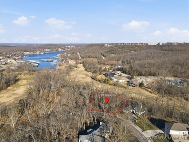 Nestled in the heart of the Village of Four Seasons, this on Seasons Ridge At Four Seasons in Missouri - for sale on GolfHomes.com, golf home, golf lot