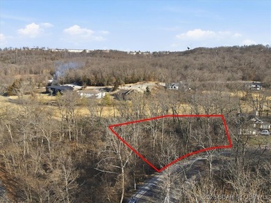 Nestled in the heart of the Village of Four Seasons, this on Seasons Ridge At Four Seasons in Missouri - for sale on GolfHomes.com, golf home, golf lot