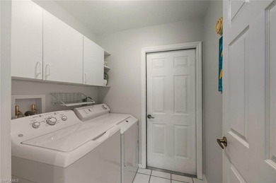 This beautiful home features an AMAZING WATER VIEW that will on Riviera Golf Club in Florida - for sale on GolfHomes.com, golf home, golf lot