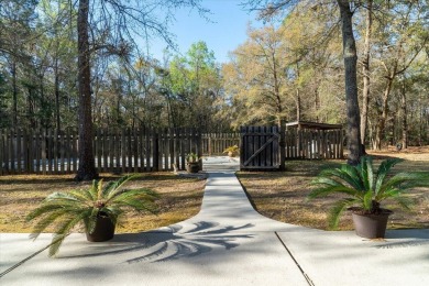 Nestled on almost 3 acres in a quiet, gated community on The Links at Stono Ferry in South Carolina - for sale on GolfHomes.com, golf home, golf lot