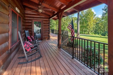 Discover this exceptional 1.5-story log home nestled in a on Lake Louise Golf Club in North Carolina - for sale on GolfHomes.com, golf home, golf lot