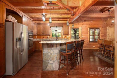 Discover this exceptional 1.5-story log home nestled in a on Lake Louise Golf Club in North Carolina - for sale on GolfHomes.com, golf home, golf lot