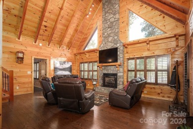 Discover this exceptional 1.5-story log home nestled in a on Lake Louise Golf Club in North Carolina - for sale on GolfHomes.com, golf home, golf lot