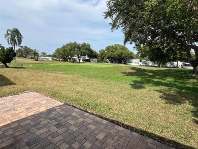 Palm Hill Country Club is a vibrant, 55+ golf and tennis on Palm Hill Golf Club in Florida - for sale on GolfHomes.com, golf home, golf lot